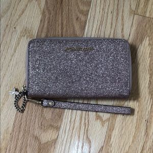 Michael Kohrs rose gold wristlet
